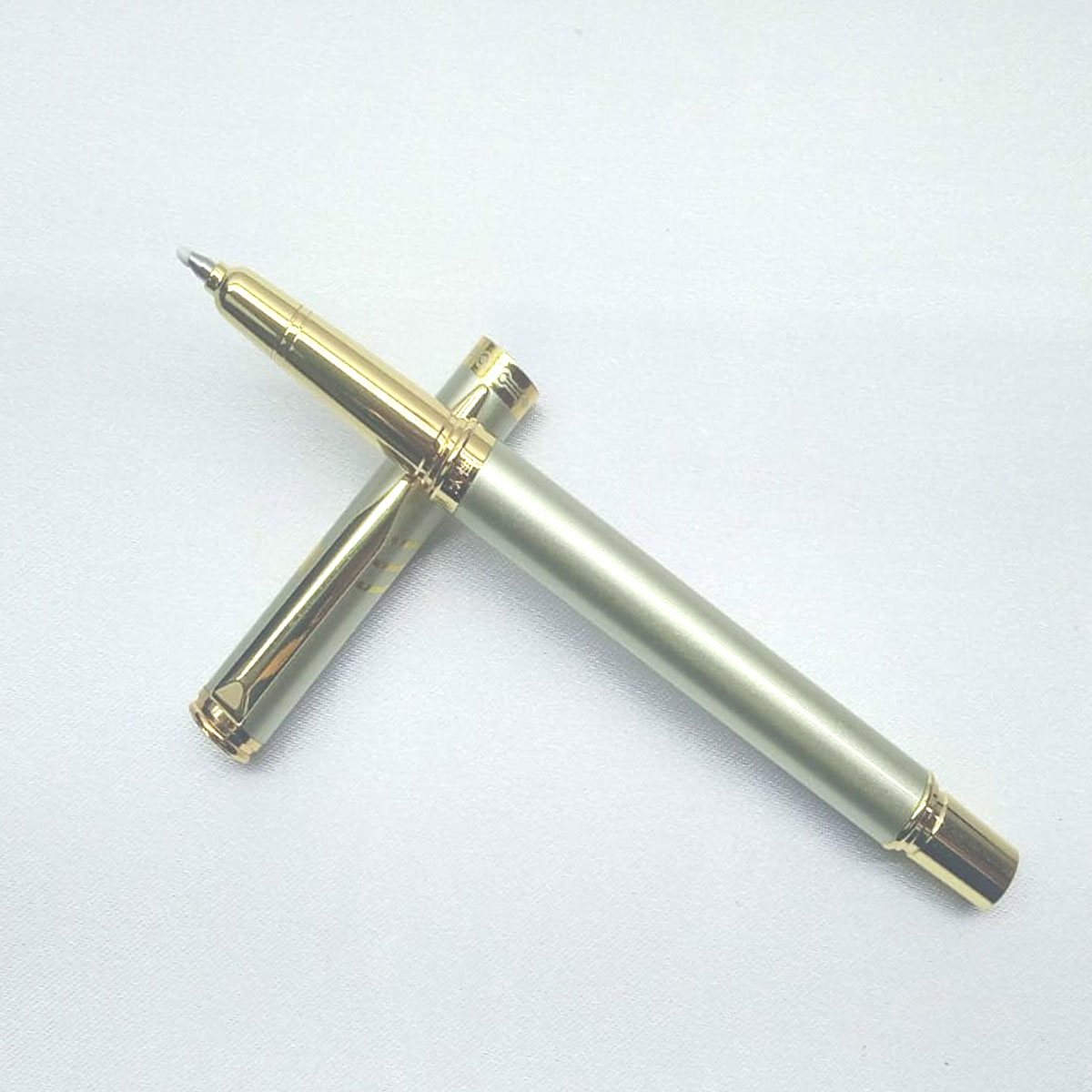 penhouse.in Pens Silver With Gold Design And Clip Cap Type Roller Ball Pen SKU 28125