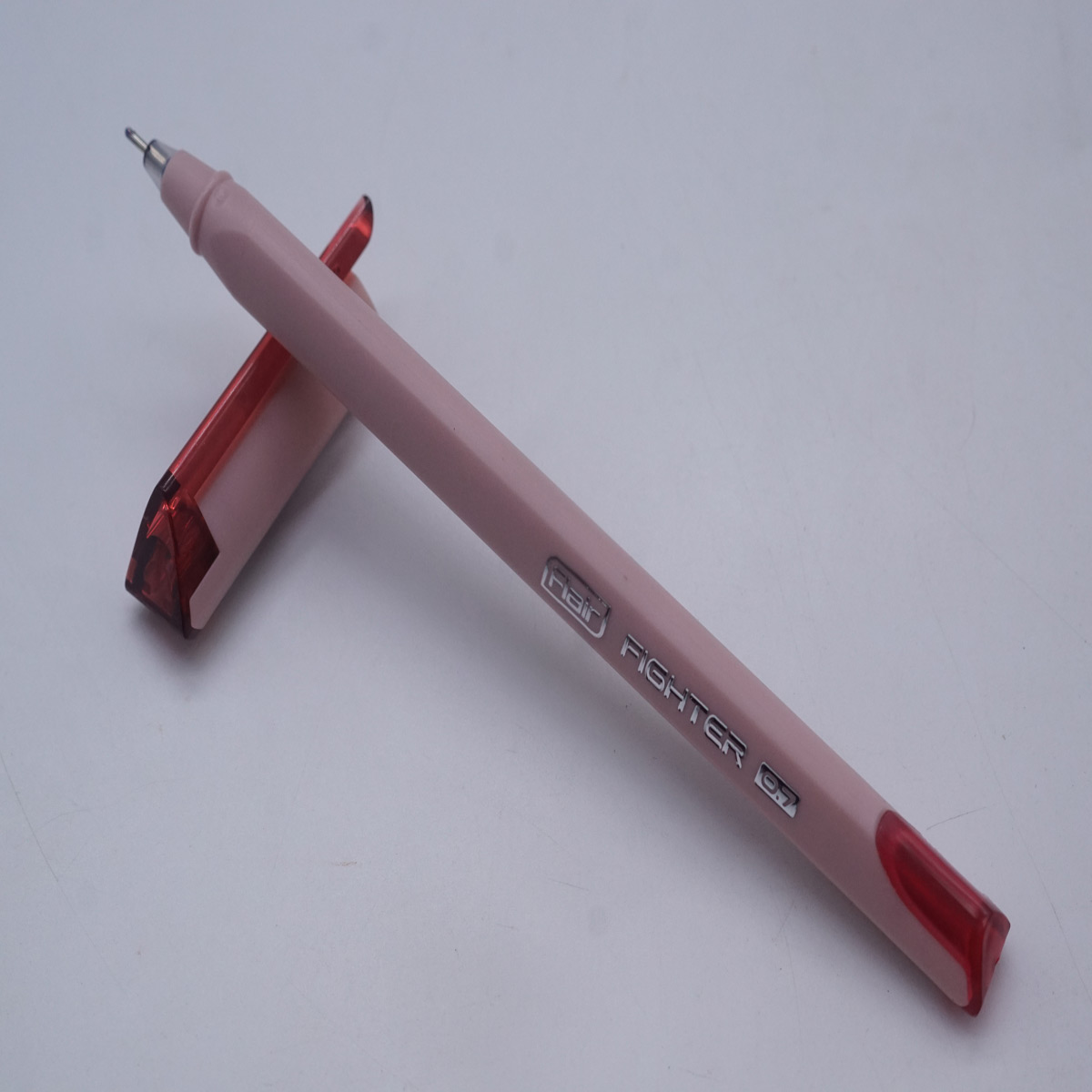 Flair Fighter 0.7 Light Pink Color Body and Cap with Blue Writing Ball Pen SKU 28192