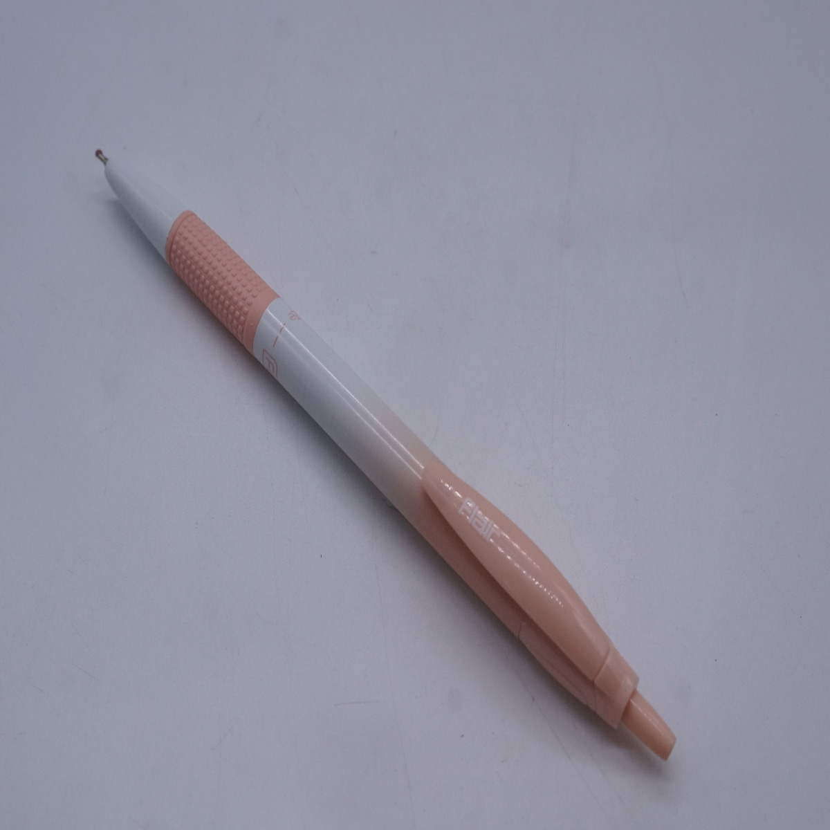 Flair Breeze Orange with White Color Body With Blue Writing With Retractable Ball Pen SKU 28203