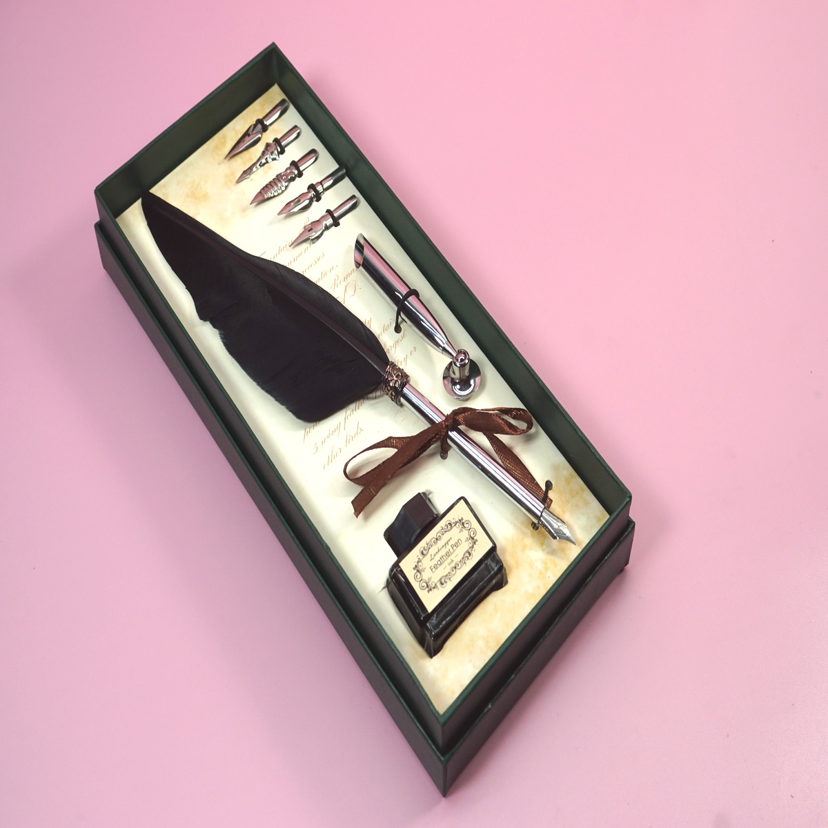 Penhouse.in  Feather Pen Black Color Feather Silver Color Grip Calligraphy Writing Dip Pen 5 Nibs Ink Bottle With Silver Stand SKU 28360