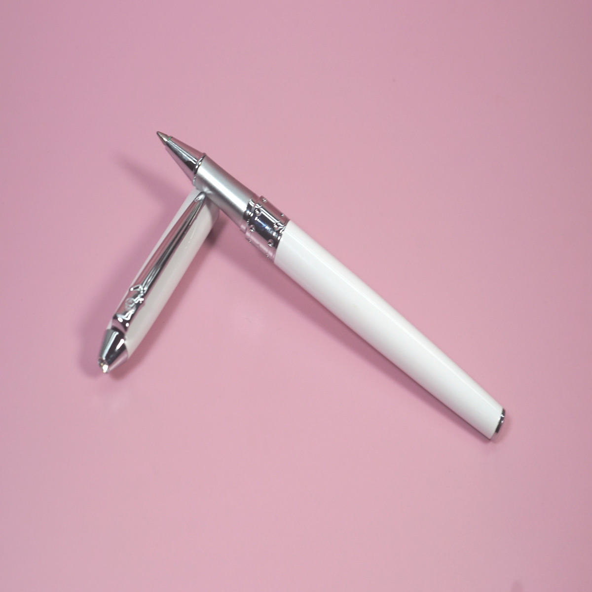 Pimio 605 White Color Body and Cap with Silver Clip Top On Stone and Silver Grip Roller Ball Pen  SKU 28381