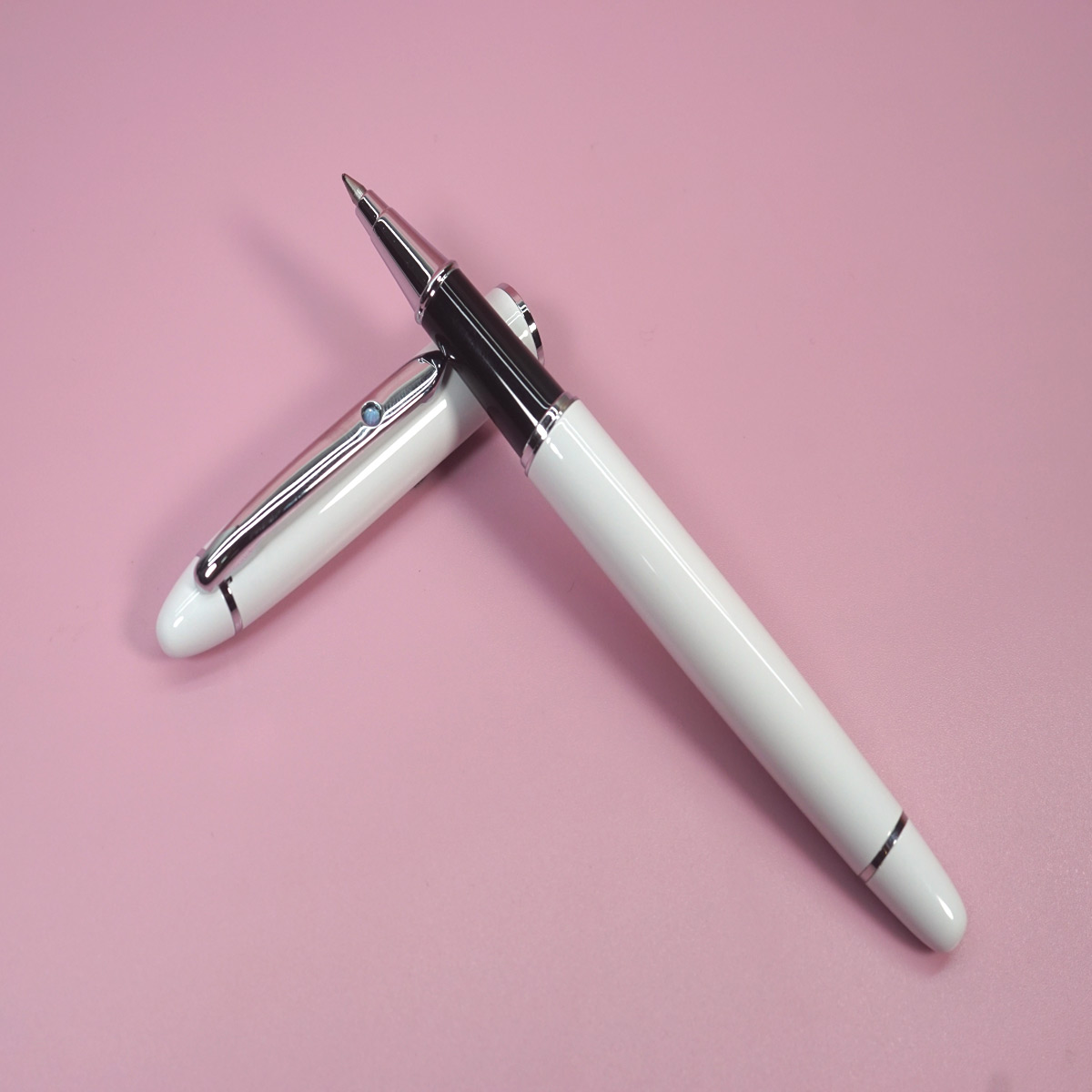 Pimio 608 Glossy White Color Body and Cap with Silver Clip On Blue Stone Roller Ball Pen  SKU 28383
