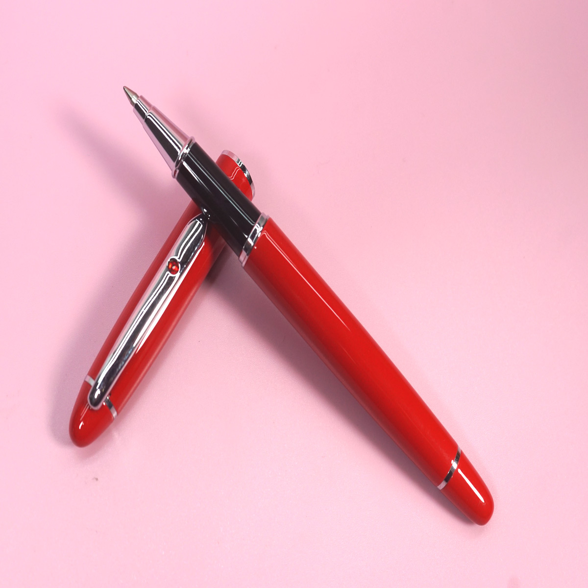 Pimio 608 Glossy Red Color Body and Cap with Silver Clip On Red Stone Roller Ball Pen  SKU 28384