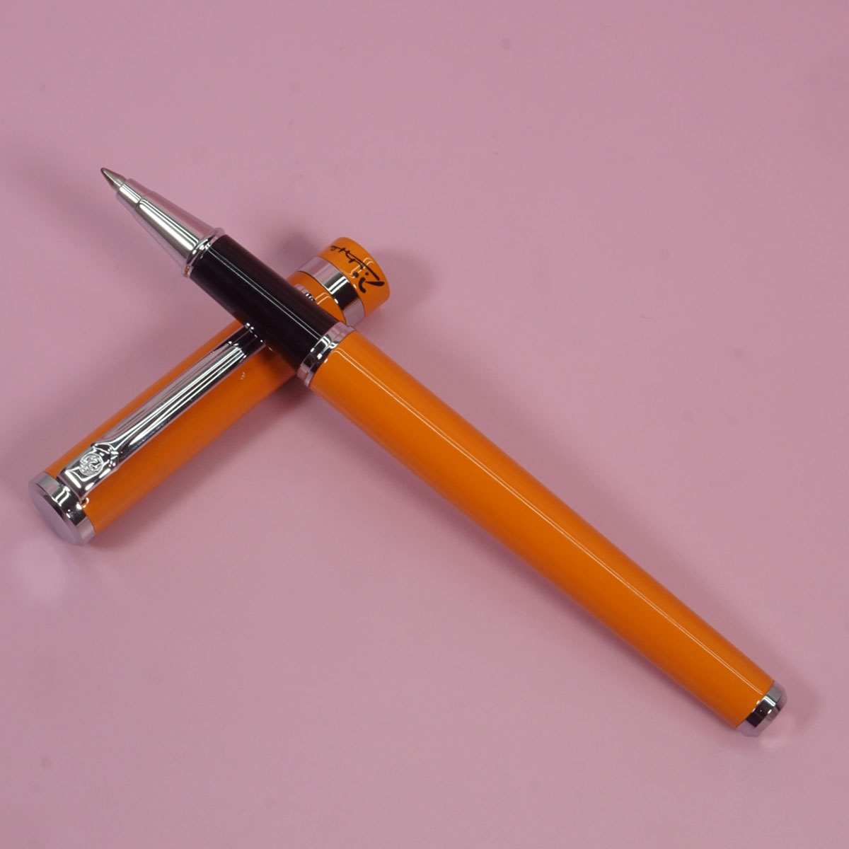 Pimio 609 Glossy Orange Color Body With Silver Clip And Tip Fine Tip Cap Type Roller Ball Pen  SKU 28398