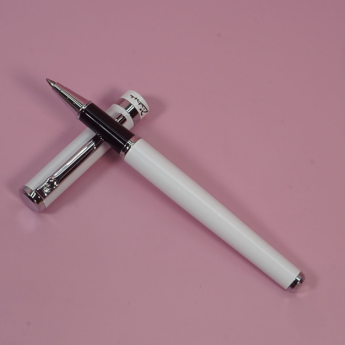 Pimio 609 Glossy White Color Body With Silver Clip And Tip Fine Tip Cap Type Roller Ball Pen  SKU 28399