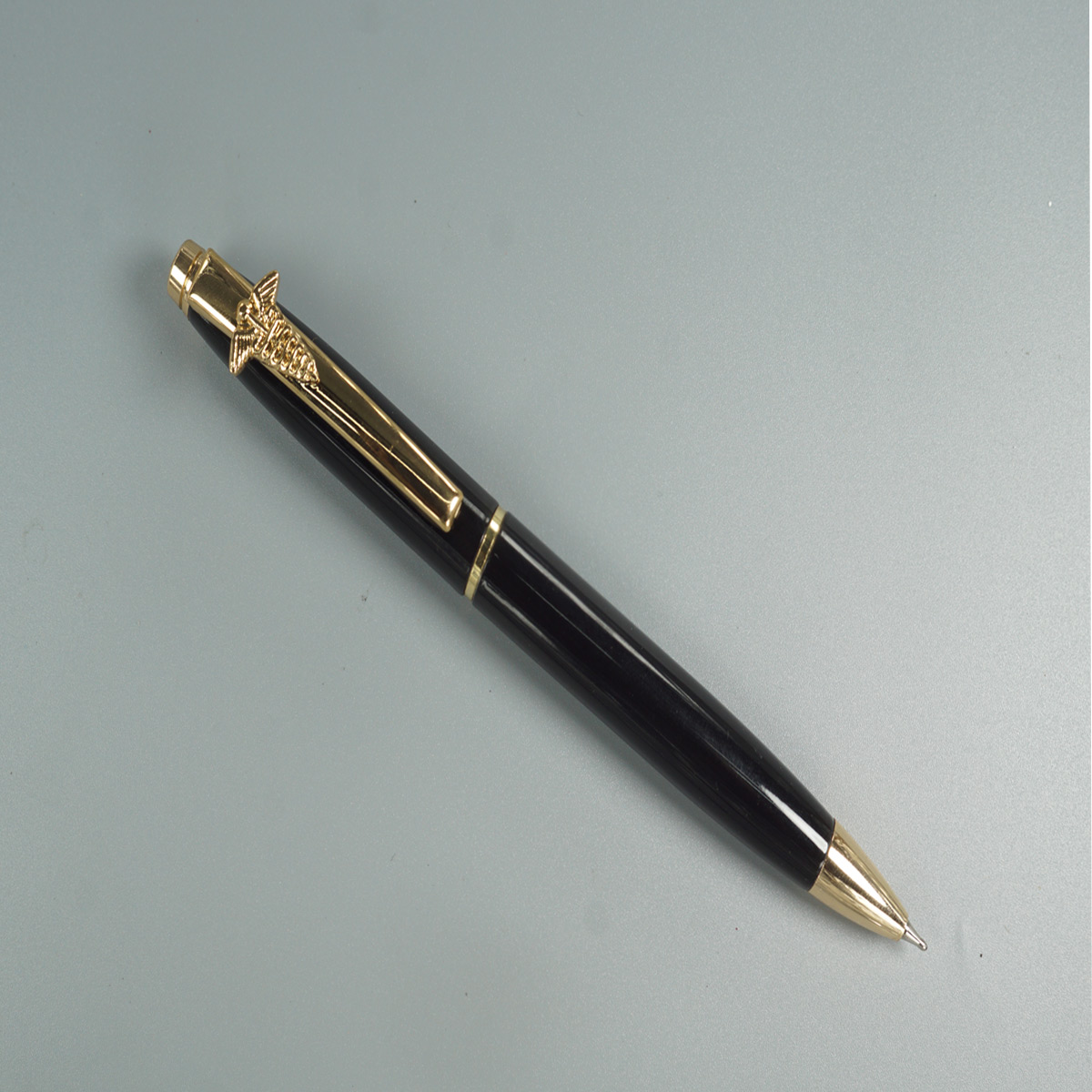 penhouse.in Glossy Block Color Body with Gold Doctor Symbol Clip With Top On White Stone Twist Type Ball Pen SKU 28451