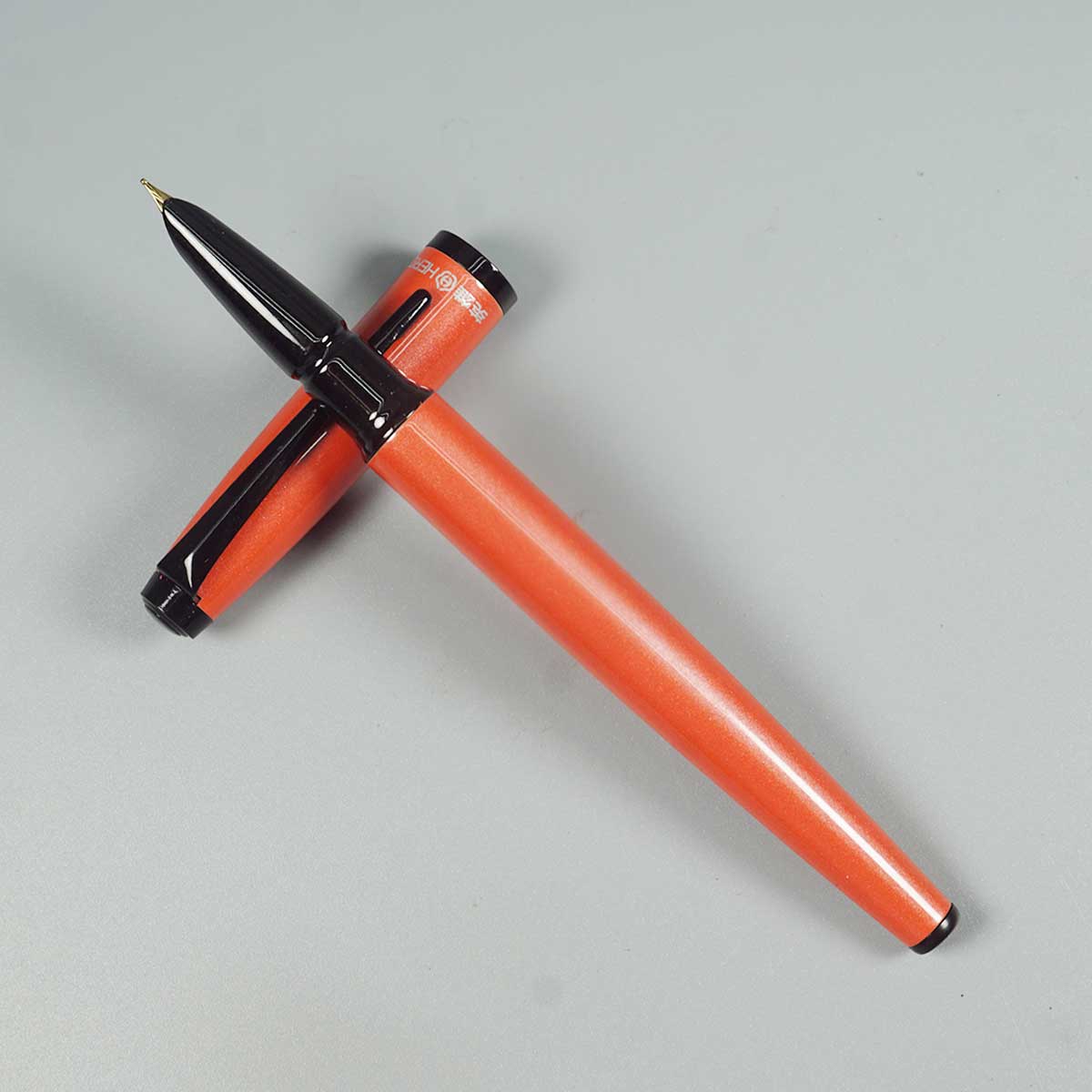 Hero 9299 Orange Color Body and Cap Fine Tipped Converter Type Fountain Pen SKU 28468
