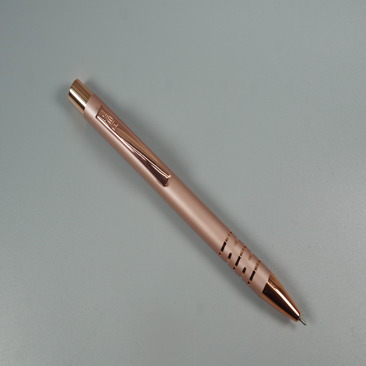 Flair Topaz Rose Gold Color Body with Copper Color Clip and Grip Metal Retractable Ball Pen  SKU 28494