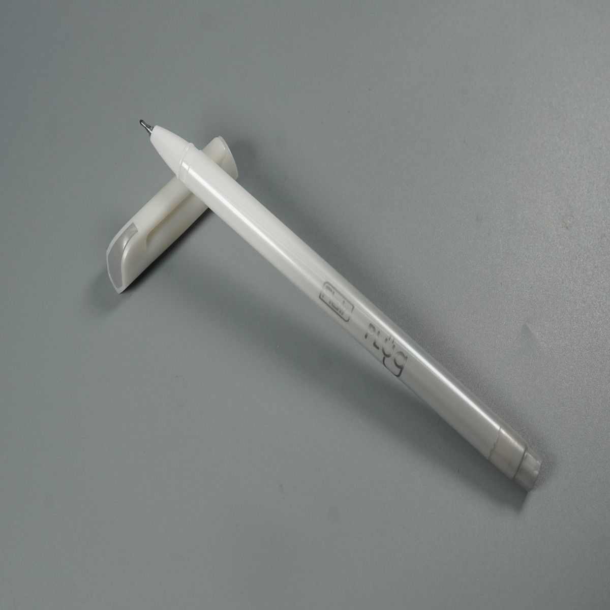 Flair Plug White and Grey Color Body with Fine Tip Black Writing Cap Type Gel Pen SKU 28502