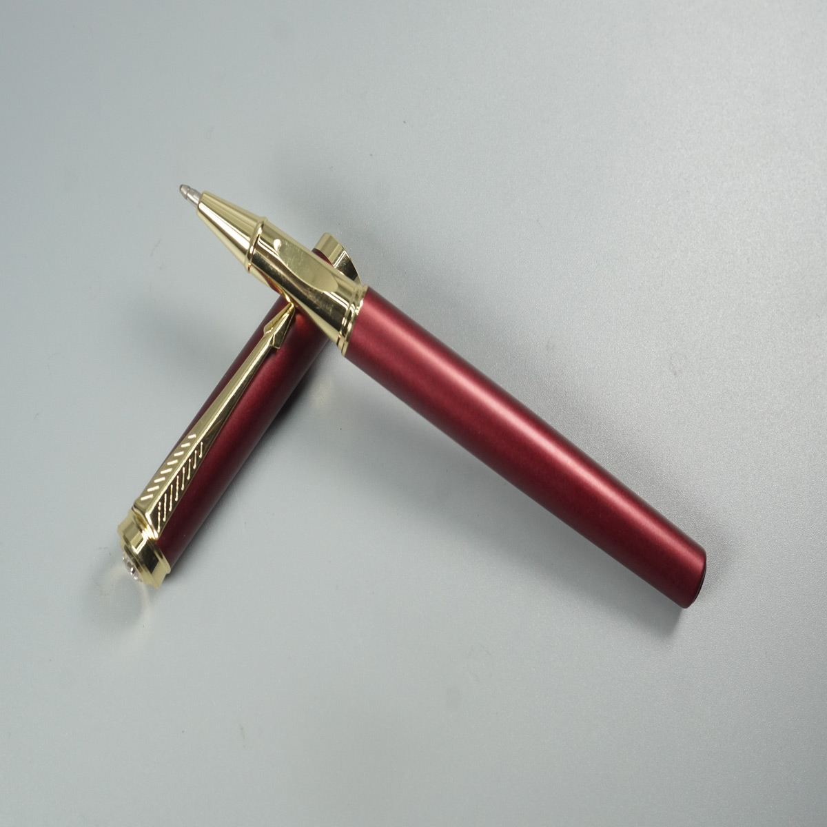 penhouse.in 8020 Matte Maroon Color body and Cap Gold Clip and Grip Top On Stone Roller Ball Pen SKU 28519