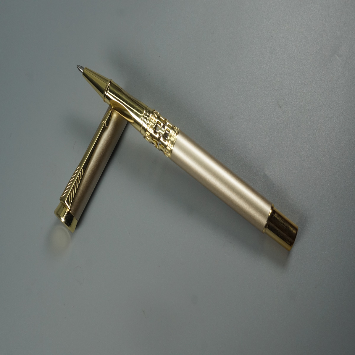 Luoshi 3217 Gold Color Body and Cap with Gold Clip and Cut Design Grip Roller Ball Pen SKU 28523