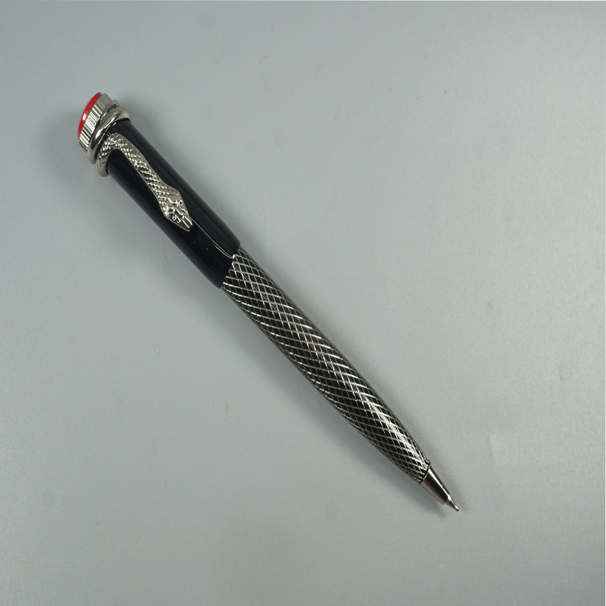 penhouse.in Silver with Black Color Body with Snake Silver Clip Fine Tip Top On Red Twist Type Ball Pen   SKU 28529