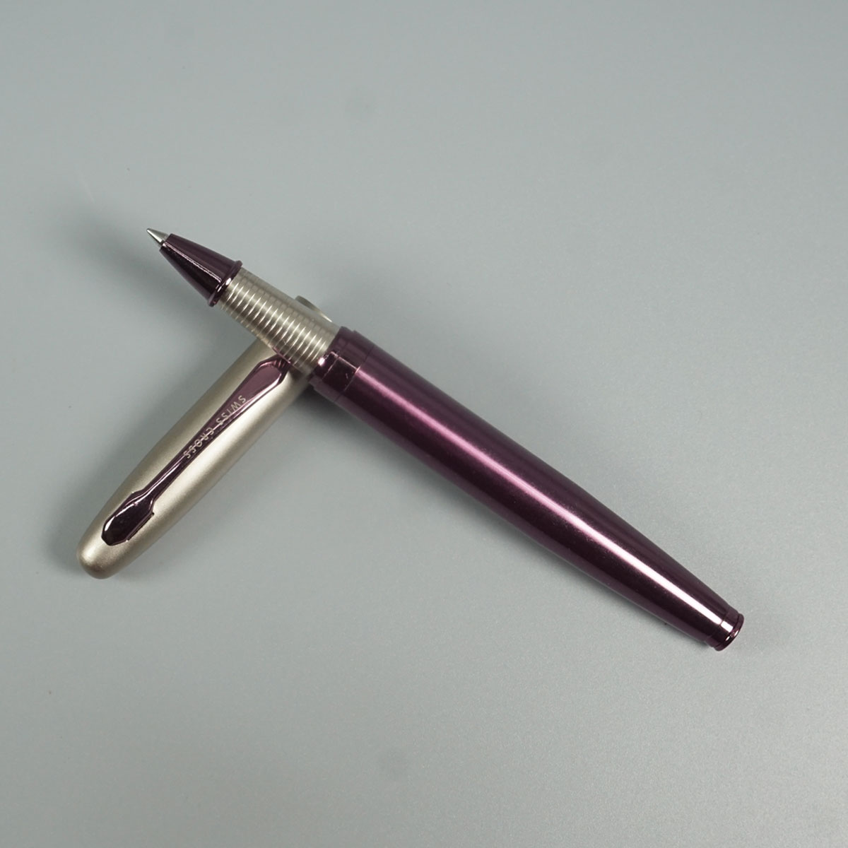 Swiss Cross 1008 Purple Color Body With Silver Color Cap And Fine Tip Roller Ball Pen SKU 28557