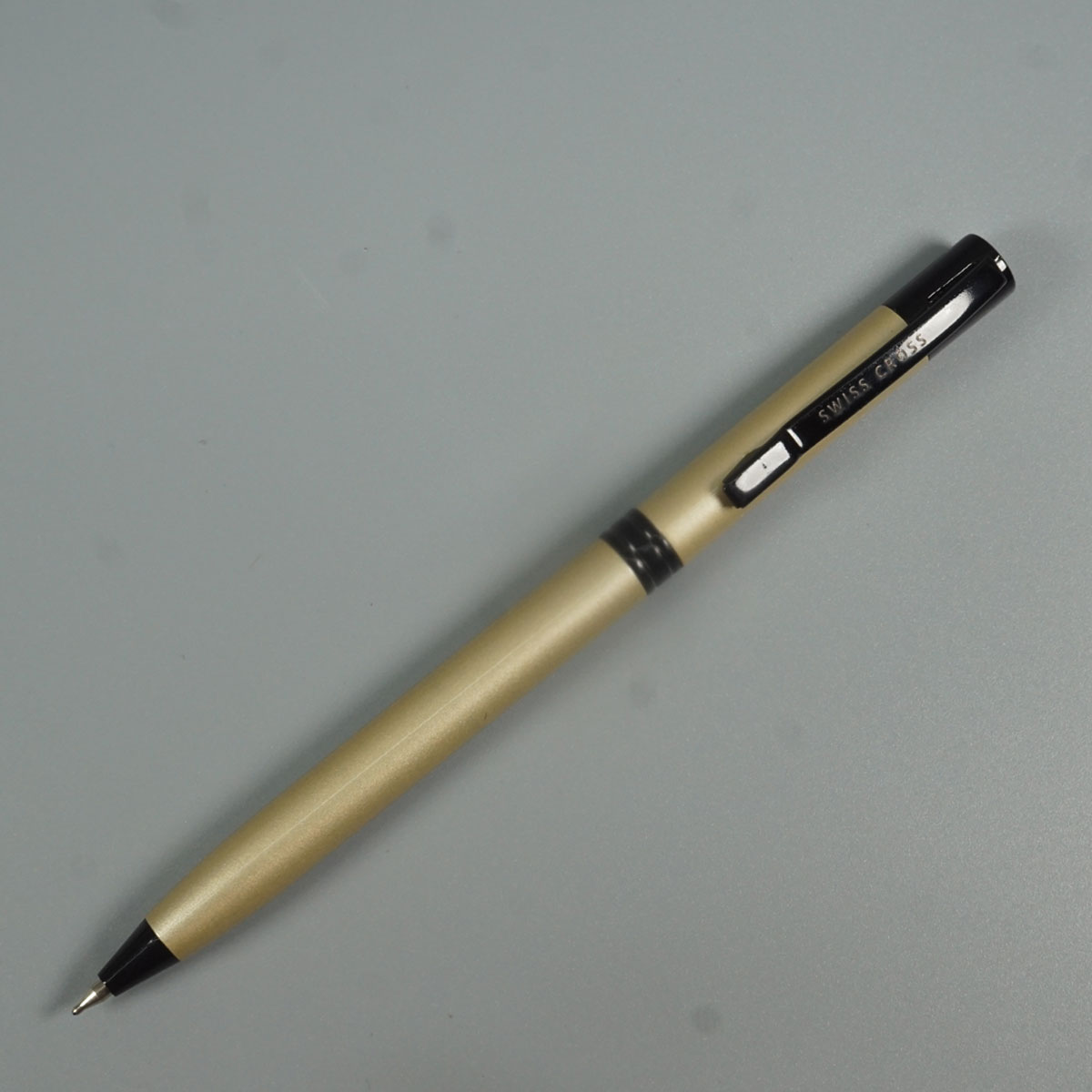 Swiss Cross 2082 Light Gold Color Body And Black Color Trim And Clip Twist Type Ball Pen SKU 28559