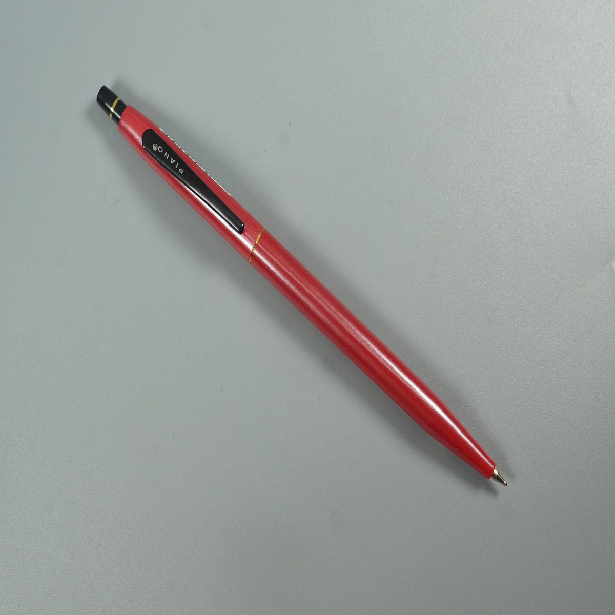 Piano Red Color Body with Black color Clip Retractable Ball Pen SKU 28581
