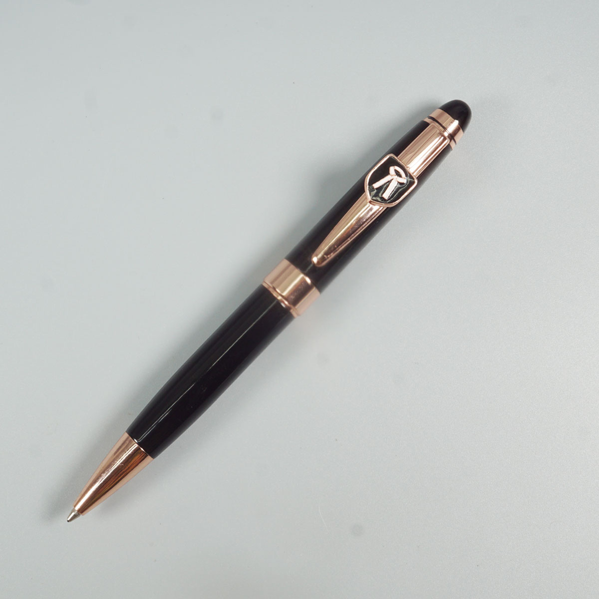 penhouse.in Glossy Black Color Body With Rose Gold Clip And Advocate Symbol Medium Tip Twist Type Ball Pen SKU 28613