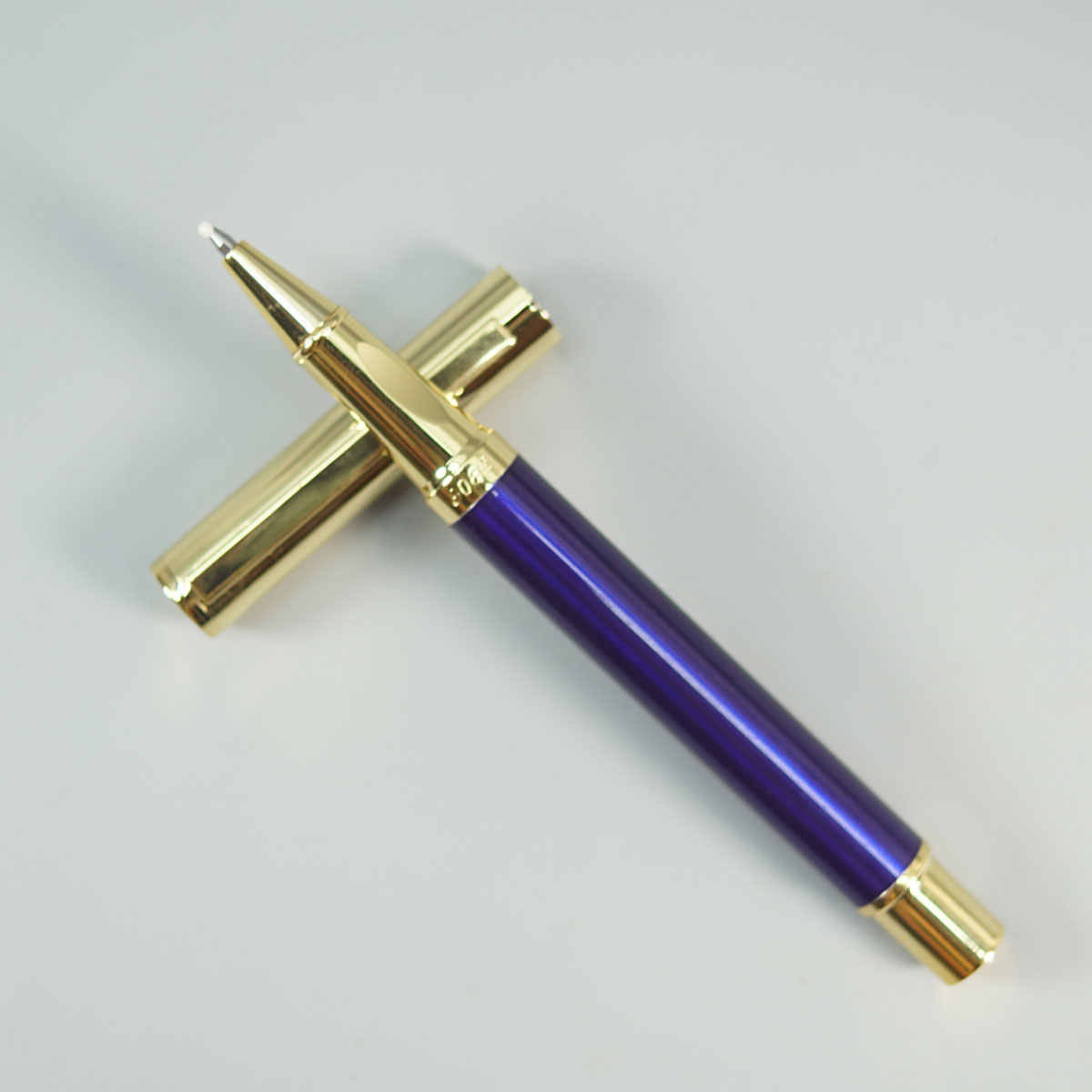 Dikawen 8082 Glossy Blue Color Body With Gold  Cap And Roller Ball Pen SKU 28666
