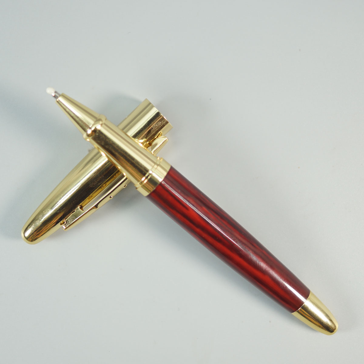 penhouse.in Brown Wood Marble Color Body With Gold Color Cap Roller Ball Pen SKU 28671