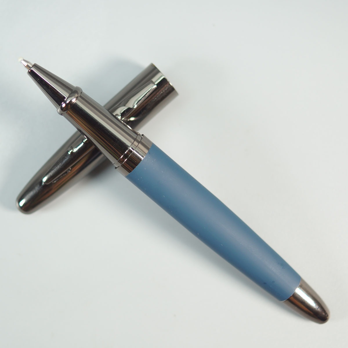 penhouse.in Matte Blue Color Body With Gun Metal Color Cap And Trim Roller Ball Pen SKU 28673