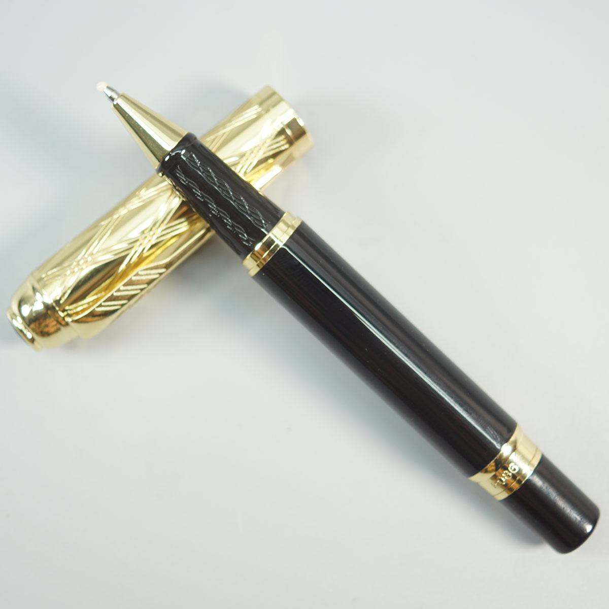 Dikawen 8086 Black Color Body With Design Gold Color Cap And Trim Roller Ball Pen SKU 28675