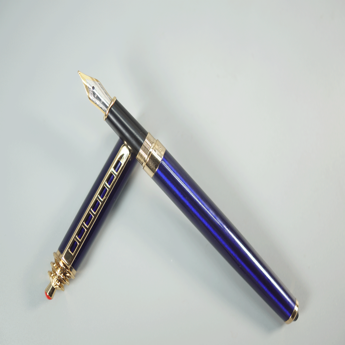 Jinhao 16 Glossy Blue Color Body With Design On Cap And Golden Color Clip Fine Nib Converter Type Fountain Pen SKU 28682