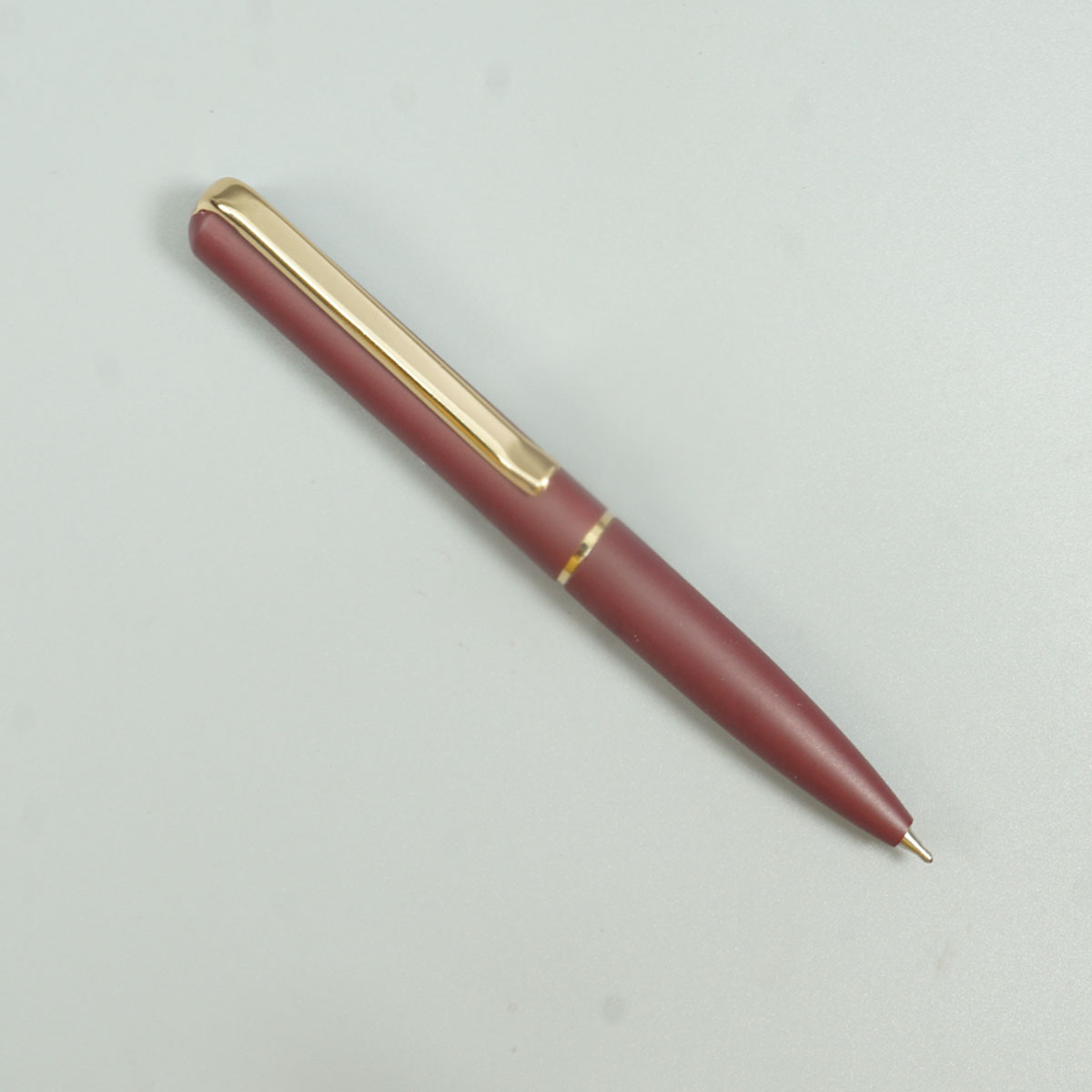 penhouse.in Mini Matte Merrown Color Body With Gold Color Clip Twist Type Ball Pen SKU 28712