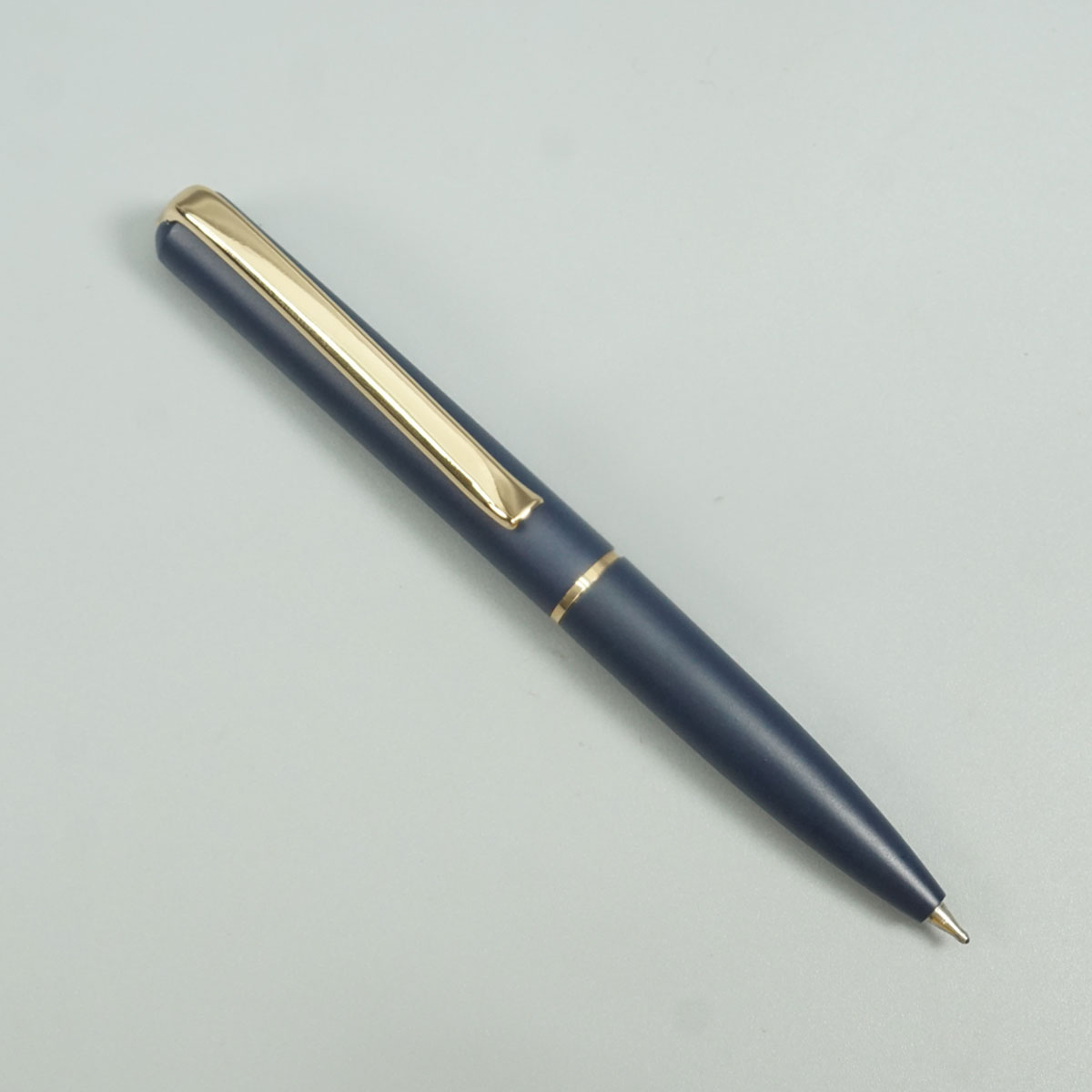 penhouse.in Mini Matte Dark Blue Color Body With Gold Color Clip Twist Type Ball Pen SKU 28713