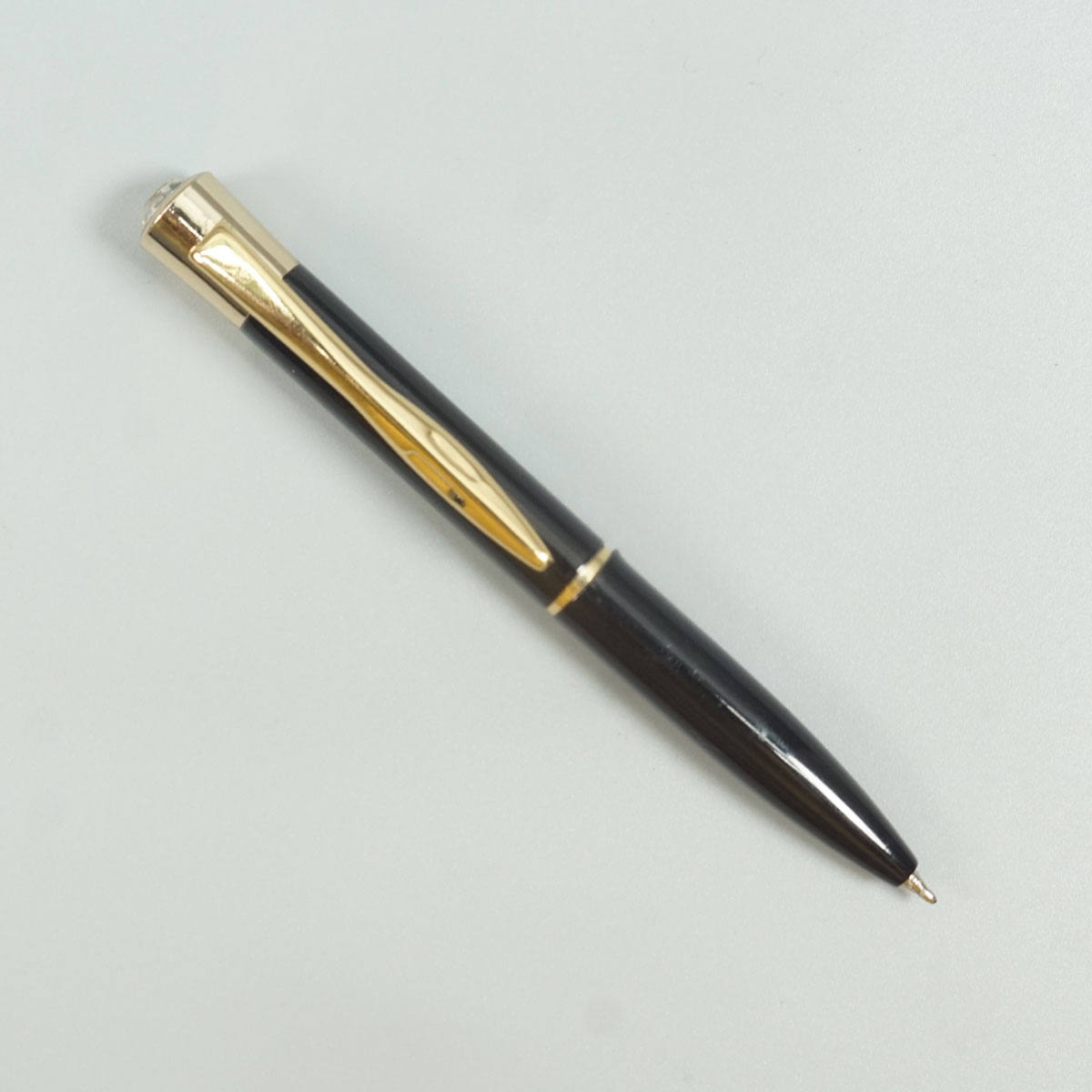 penhouse.in Mini Glossy Black Color Body With Gold Color Clip And Top On Stone Twist Type Ball Pen SKU 28716
