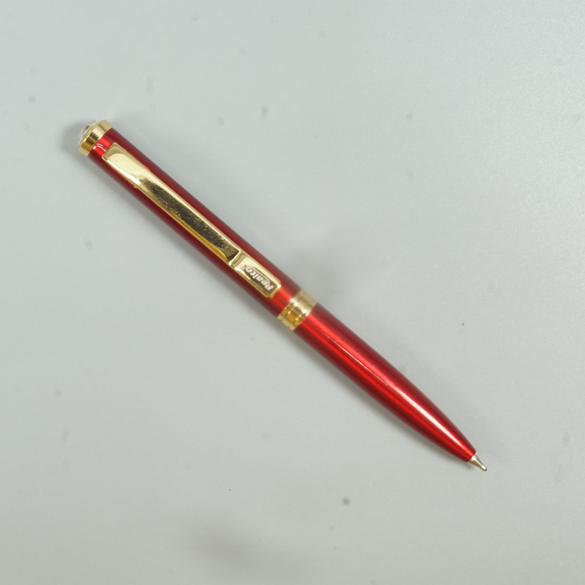Realto Mini Merrown Color Body With Gold Clip Top On Stone Twist Type Ball Pen SKU 28717
