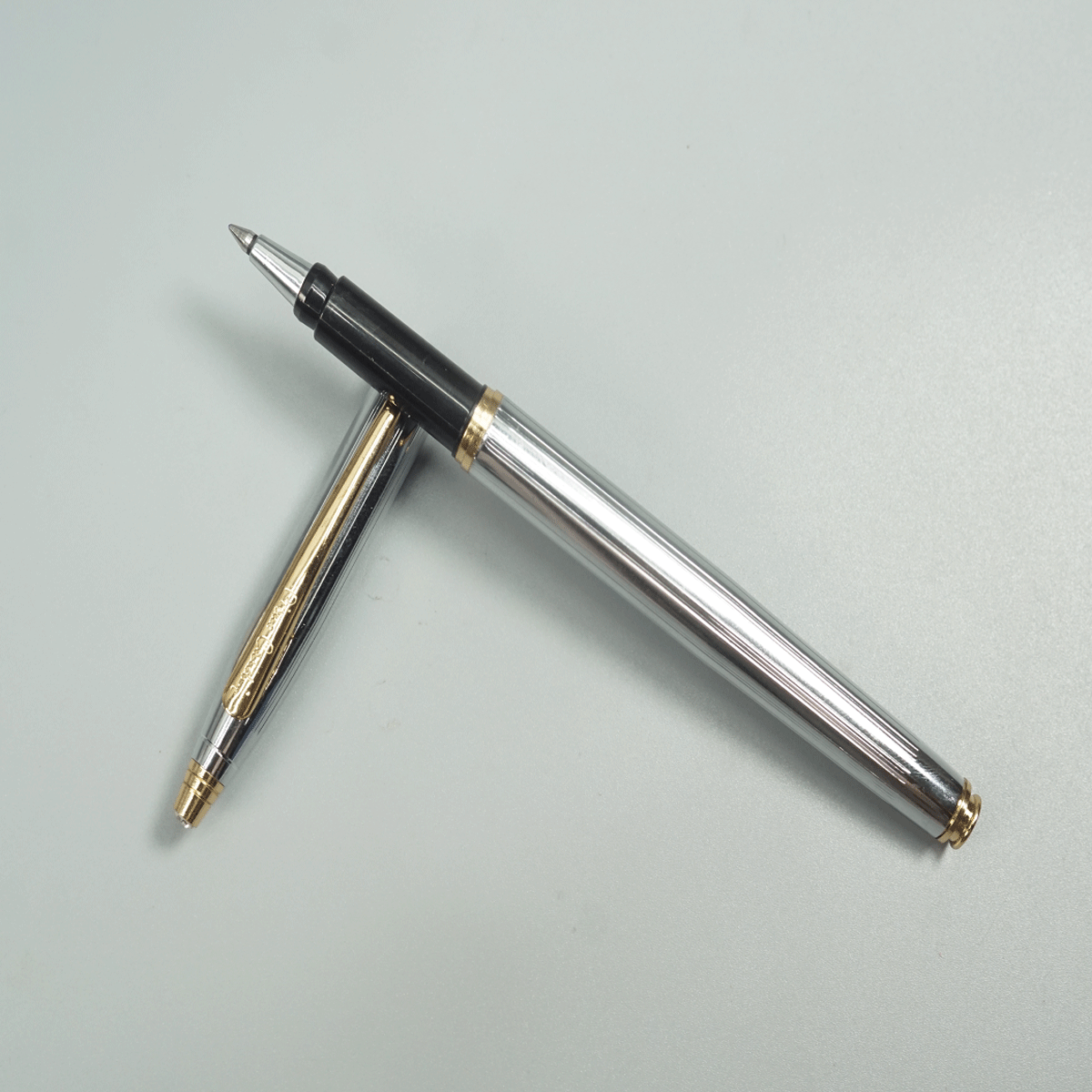 Pierre Cardin Kriss White Gold Full Silver Color Body and Cap with Gold Clip  Top On Stone Roller Ball Pen SKU 28739