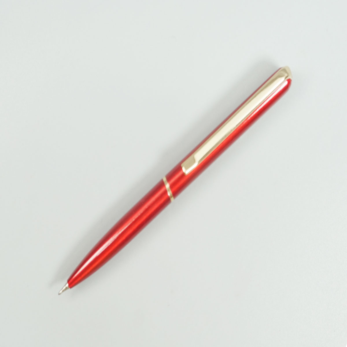 penhouse.in Mini Glossy Red Color Body With Gold Color Clip Twist Type Ball Pen SKU 28755