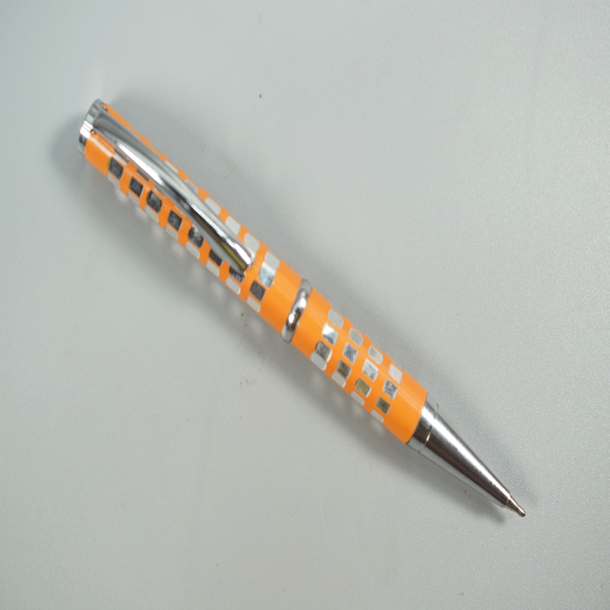 penhouse.in Mini Orange Color with Silver Clip Squre Design Twist Type Ball Pen SKU 28767