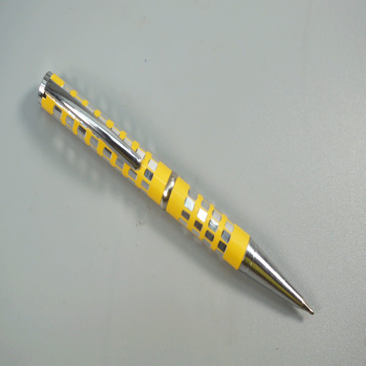 penhouse.in Mini Yellow Color with Silver Clip Squre Design Twist Type Ball Pen SKU 28769