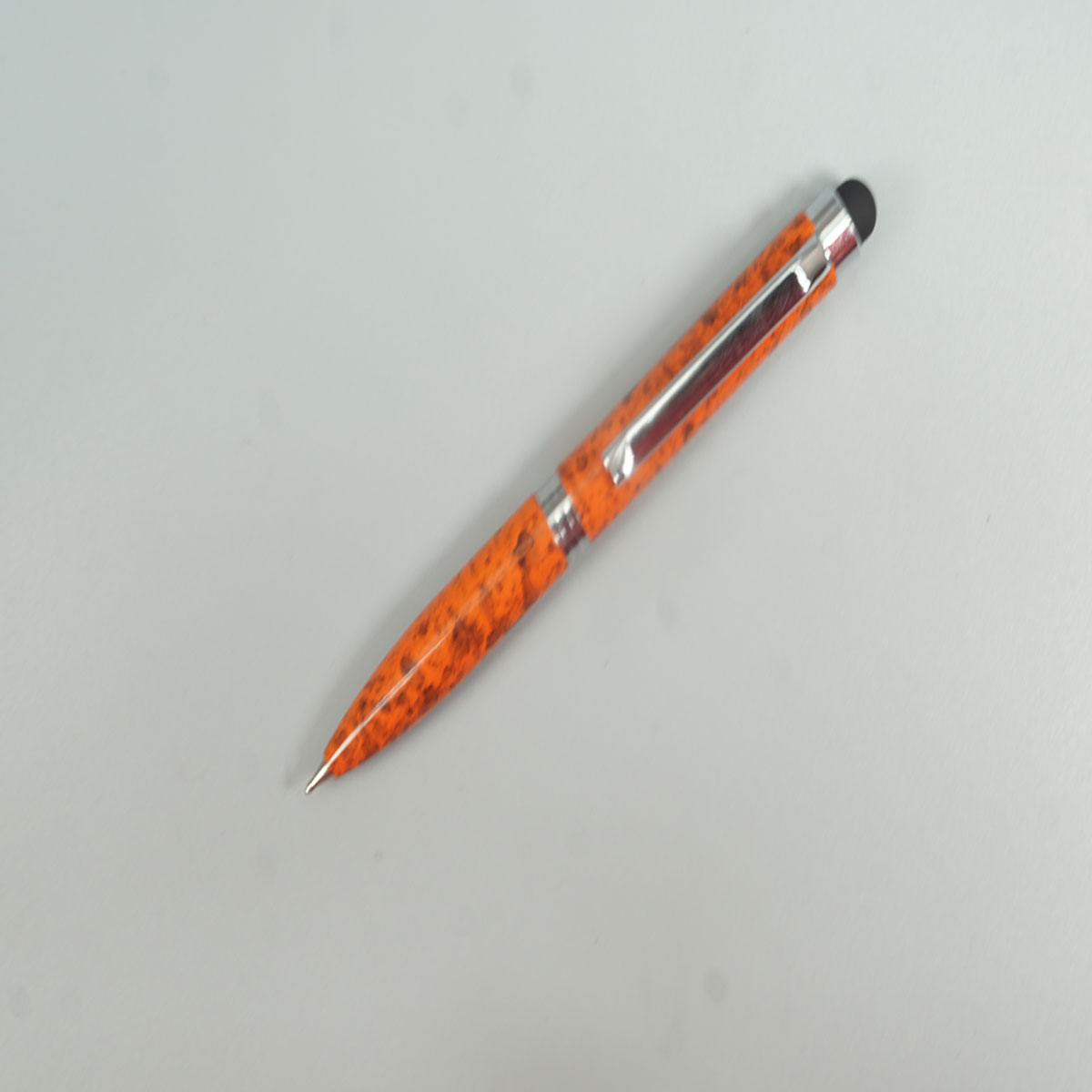 penhouse.in Mini Glossy Orange with Balck Color Body Silver Clip Marble Design Stylus Twist Ball Pen SKU 28777