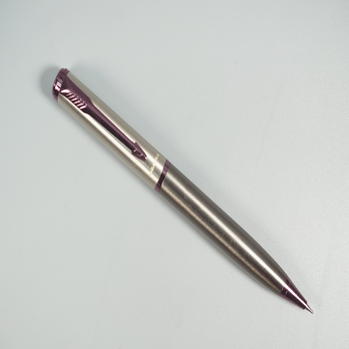 Sigaura Grey with Silver Color Body Wine Color Clip and Grip Twist Type Ball Pen  SKU 28794