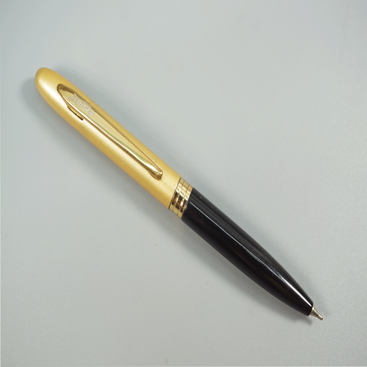 Realto Mini Black with Sandal Body with Gold Clip Twist Type Ball Pen SKU 28809