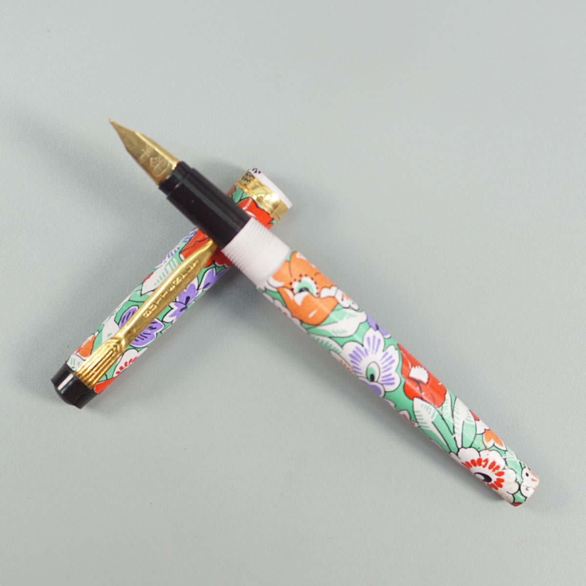 Butterfly 660 MultiColor Floral Design And Gold Clip Medium Nib Eye Dropper Model Fountain Pen  SKU 28828