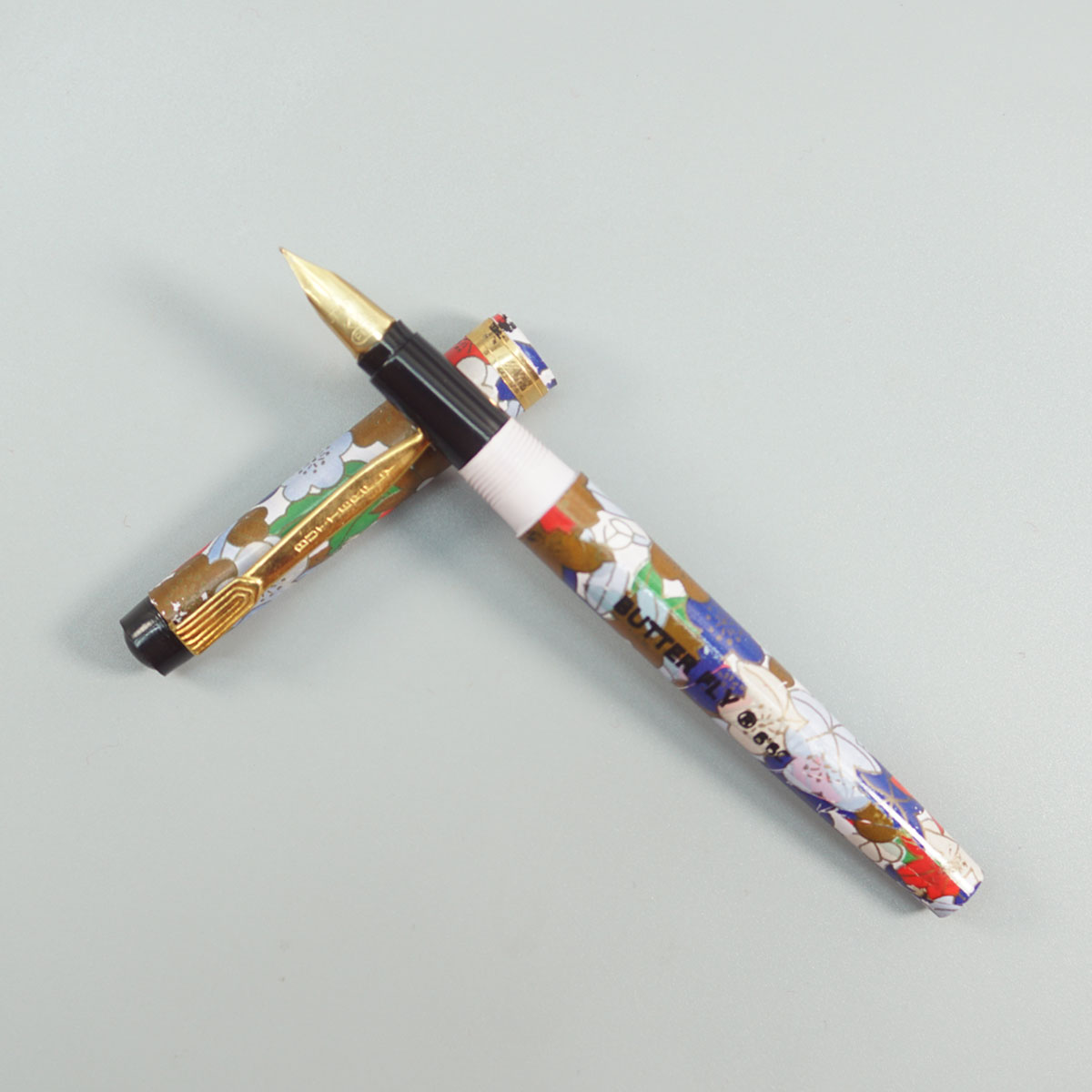 Butterfly 660 MultiColor Floral Design And Gold Clip Medium Nib Eye Dropper Model Fountain Pen  SKU 28829