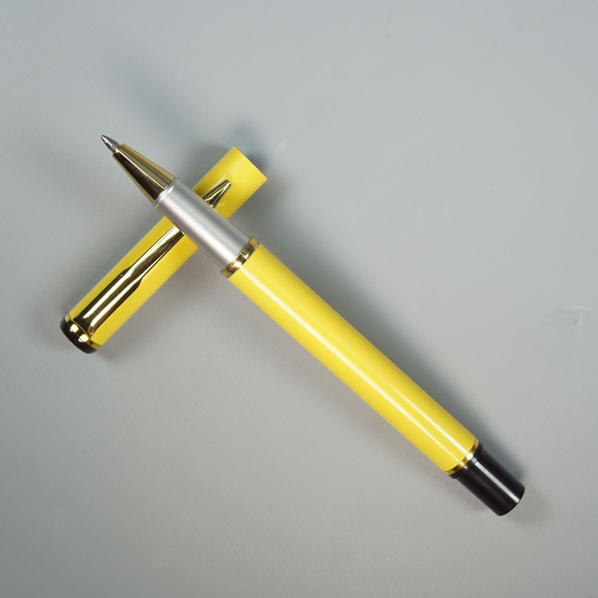 penhouse.in Yellow Color Body With Gold Clip And Cap Type Roller Ball Pen SKU 28853