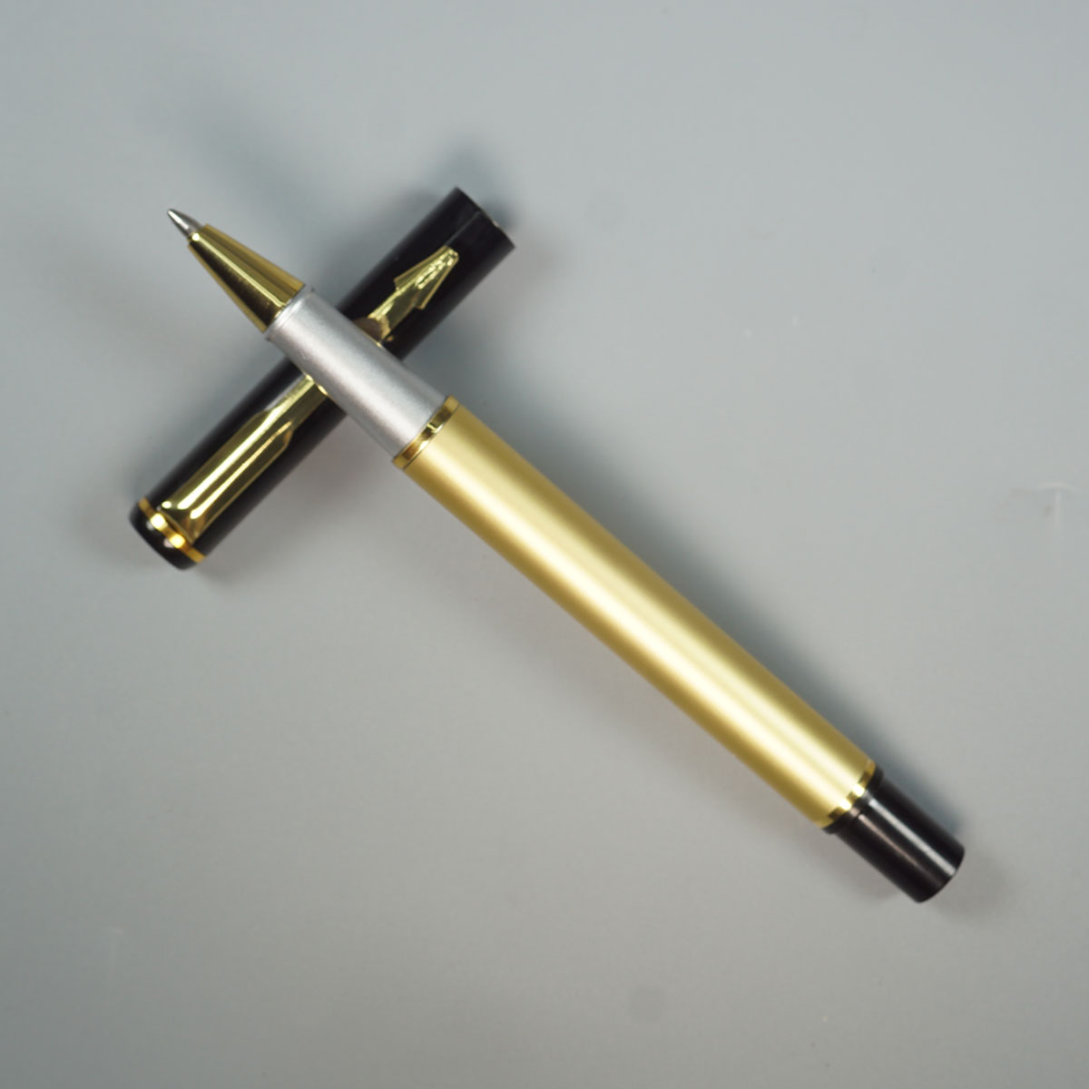 penhouse.in Gold Color Body With Black Cap And Cap Type Roller Ball Pen SKU 28854