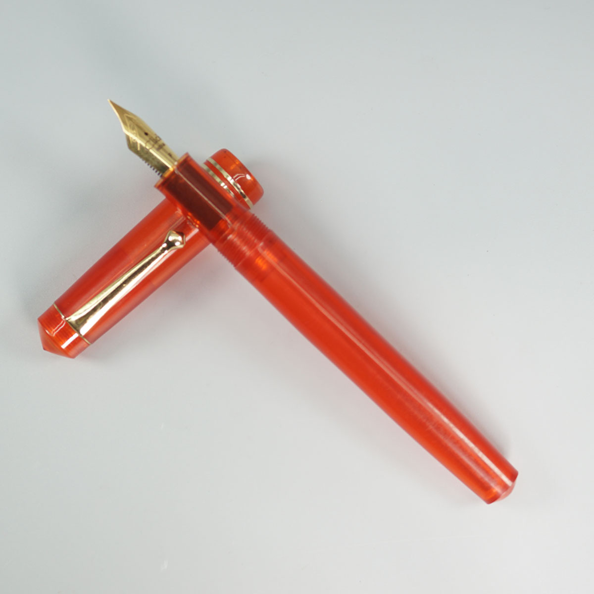 Click Aristocrat Transparent  Orange Color Body With Gold Clip And No.35 Fine Nib (3 in 1) Eye Dropper Model Fountain Pen SKU 28891