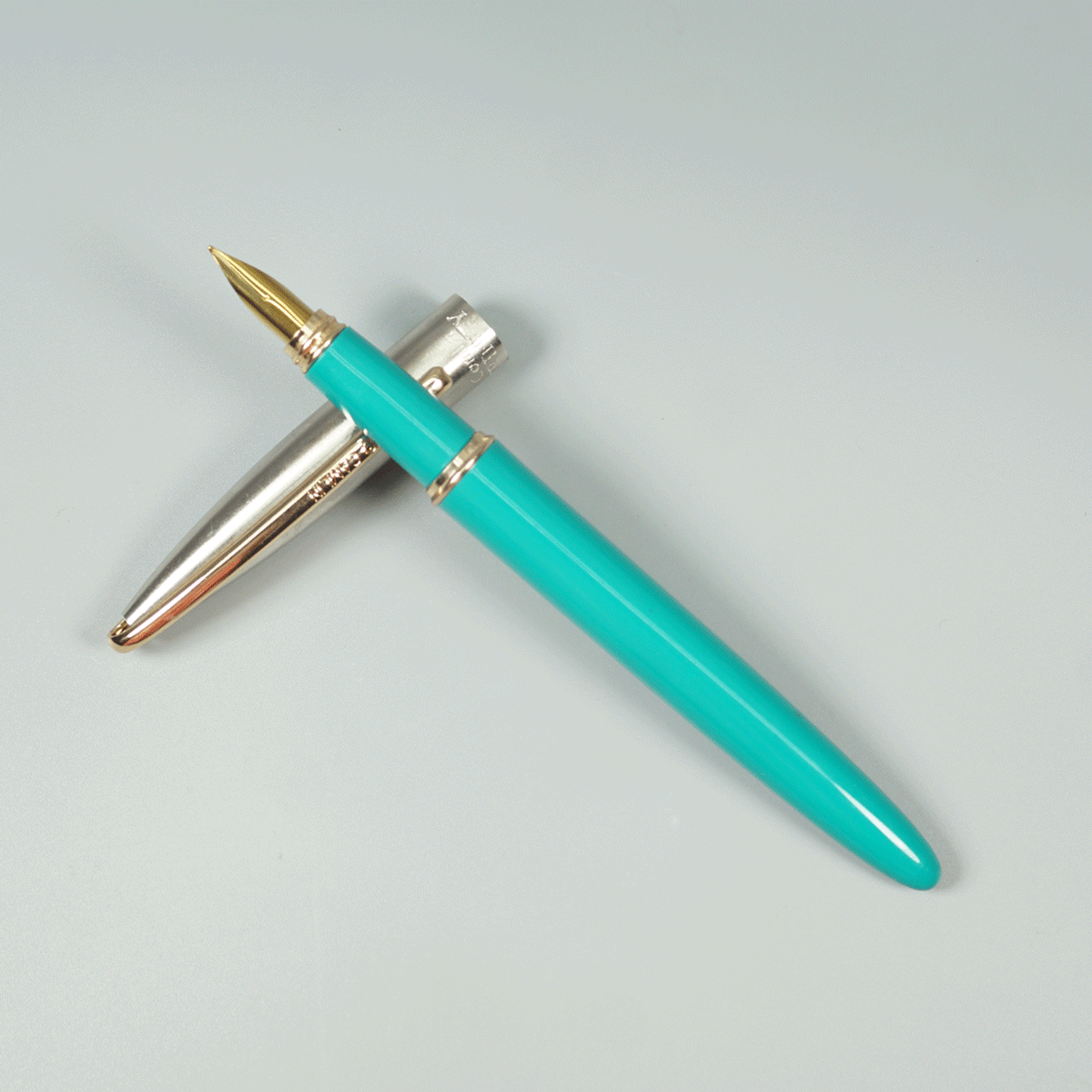 Camlin Trinity Turquoise Green Color Body With Silver Cap And Gold Clip Converter Type Fountain Pen SKU 28948