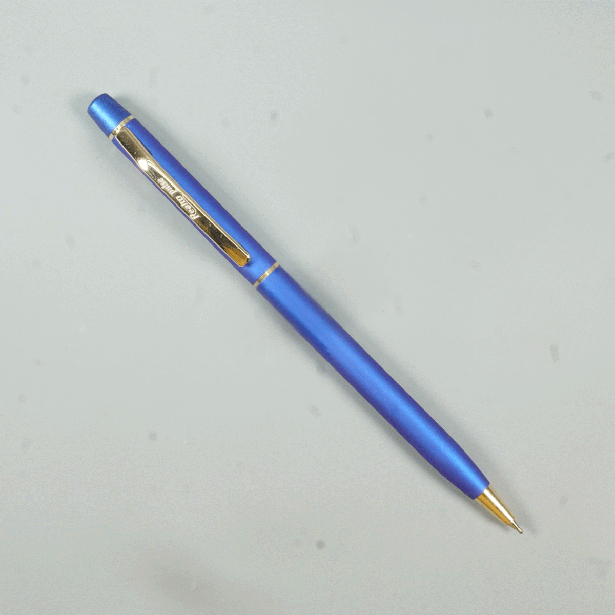Realto Pulse Blue Color Body With Gold Color Clip Slim Twist Type Ball Pen  SKU 28962