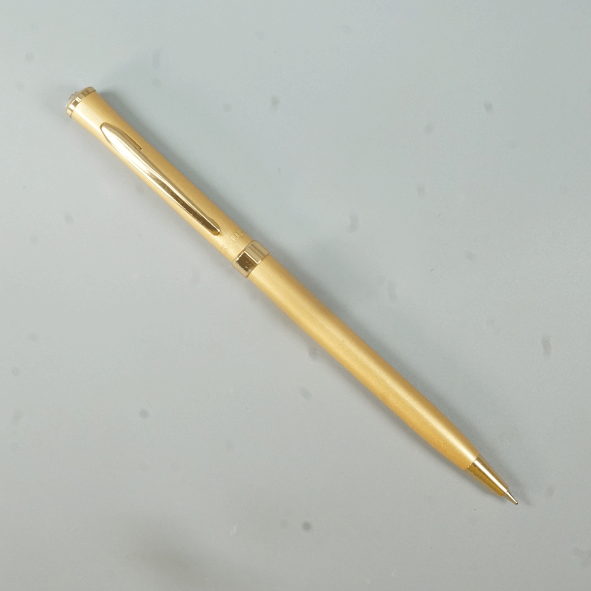 Picasso Parri Pine  Gold Color Body  With  Gold Clip Top On Stone Twist Type Ball Pen SKU 28965