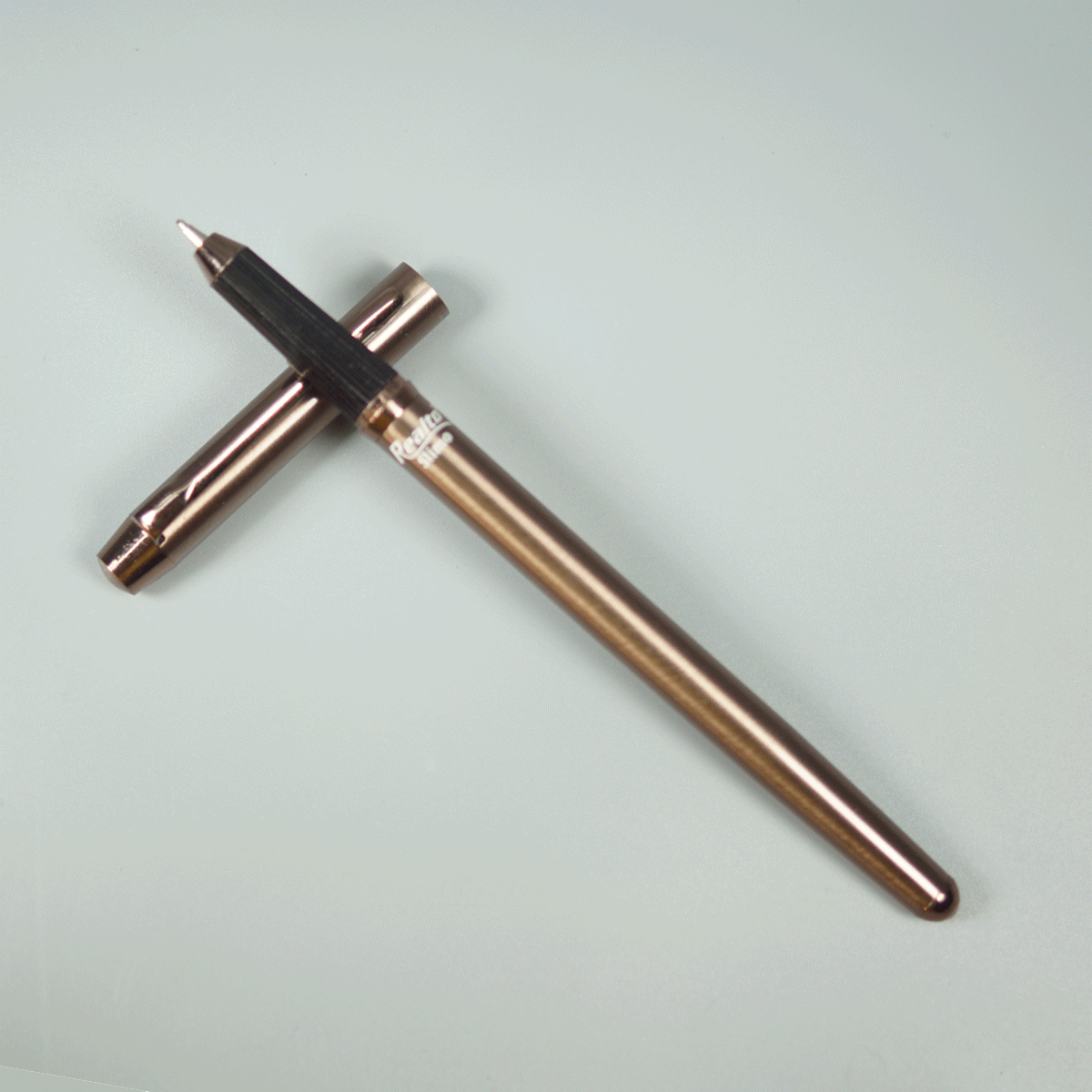 Realto Slimo Brown Color Body With Black Color Grip And Magnetic  Cap Type Ball Pen SKU 28979