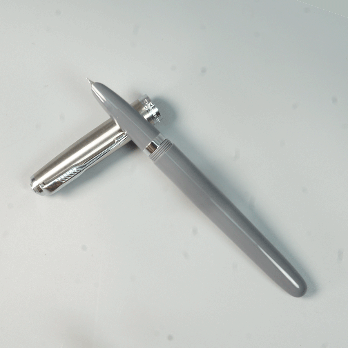 Jinhao 86 Gray Color Body With Silver Color Cap Fine Nib And converter type Founatin Pen  SKU 28981
