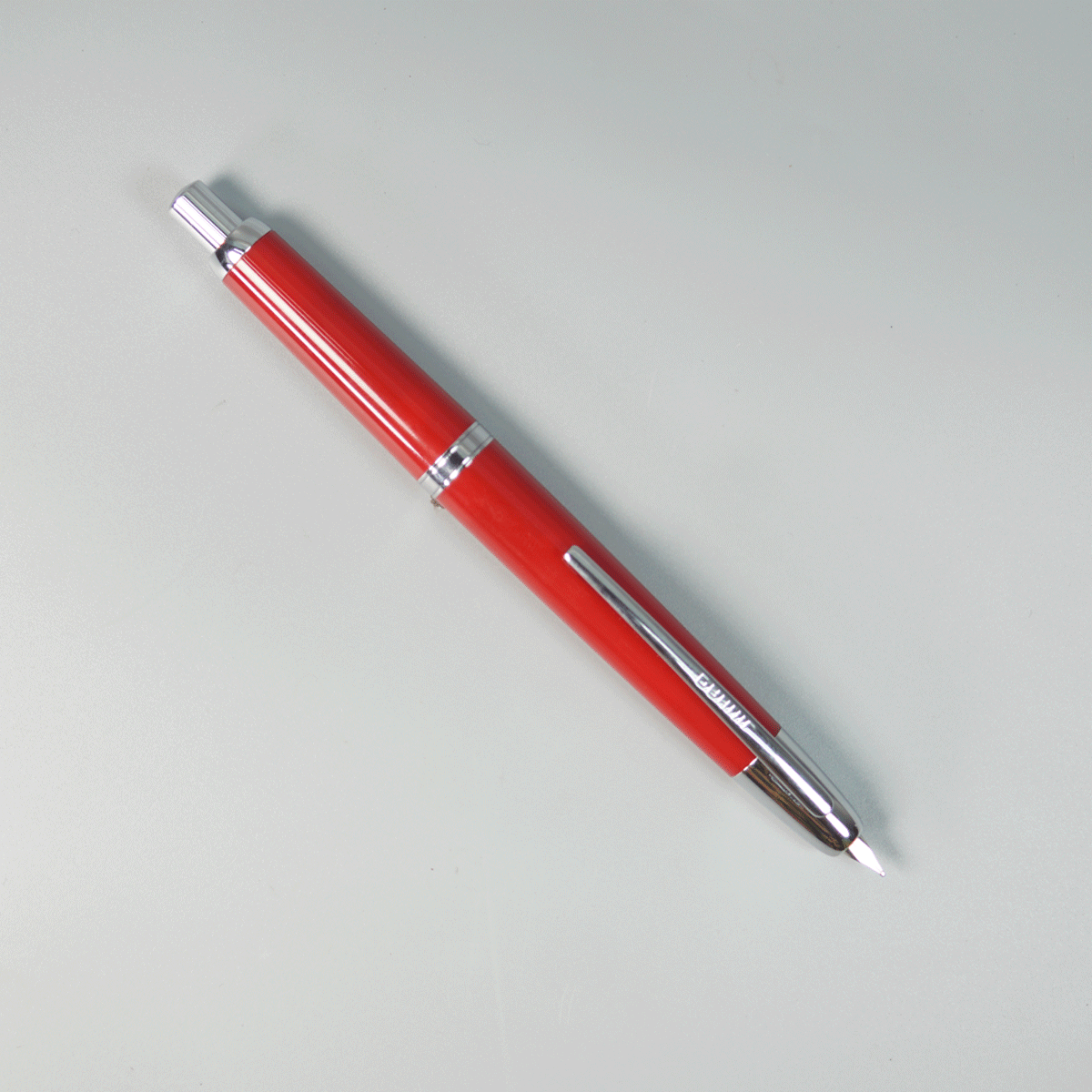 Jinhao 20 Red Color Body With Silver Clip Fine Nib Retractable Type Fountain Pen SKU 28982
