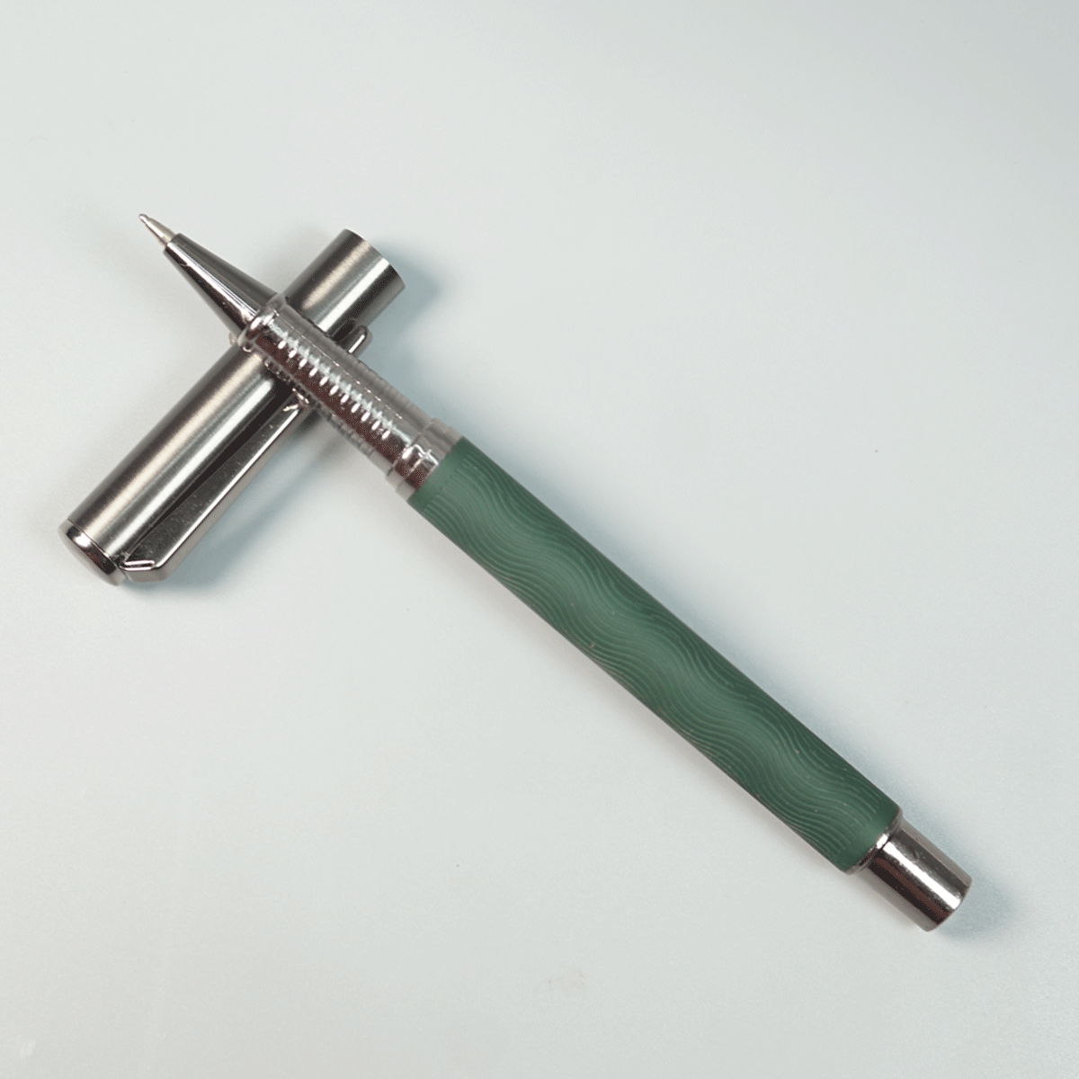 penhouse.in Pens  Green Color Body With Grey Color Clip Cap Type Roller Ball Pen SKU 28991