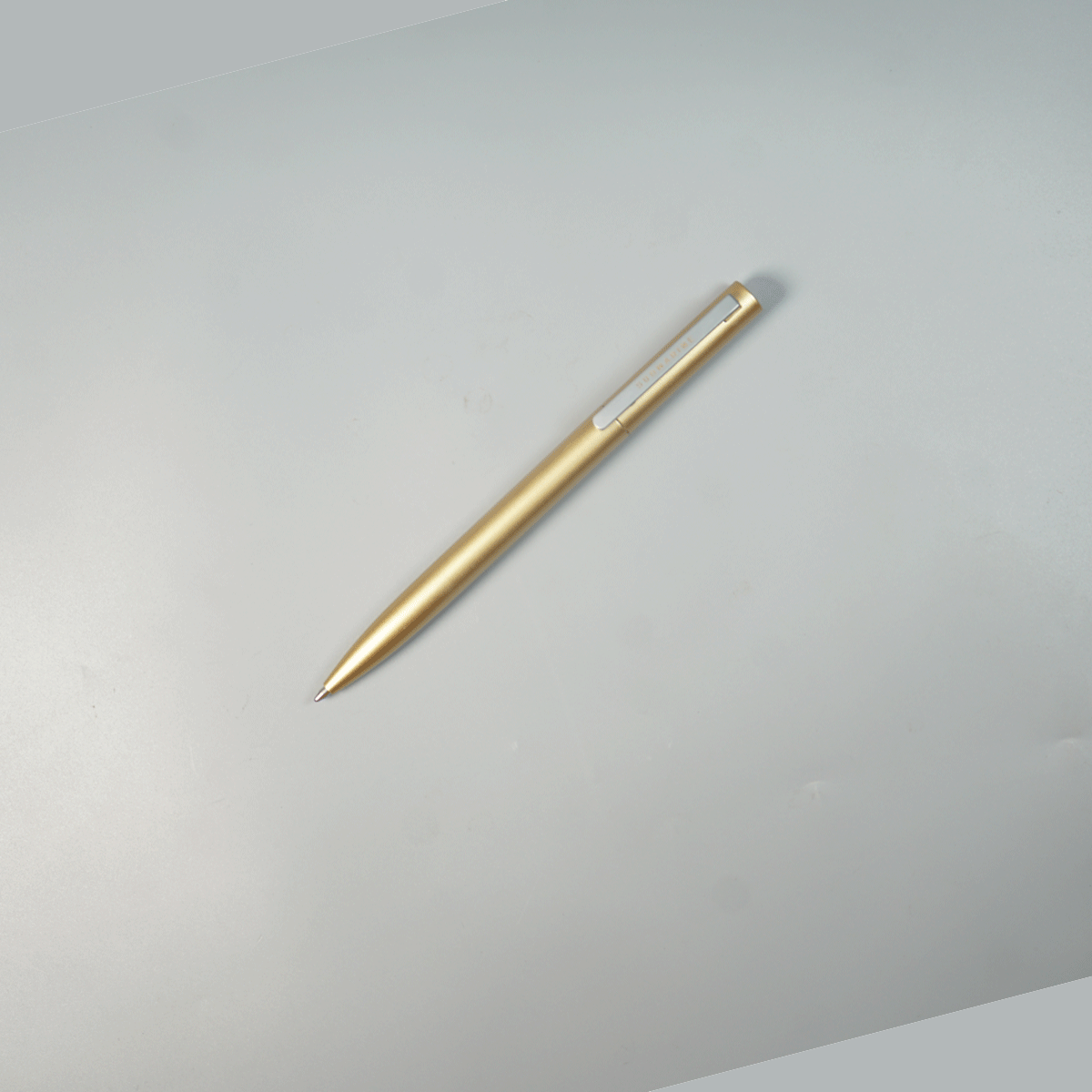 Submarine 2034 Mogra Fragence Golden Color Body With Grey color Clip Twist Type Ball pen SKU 28999