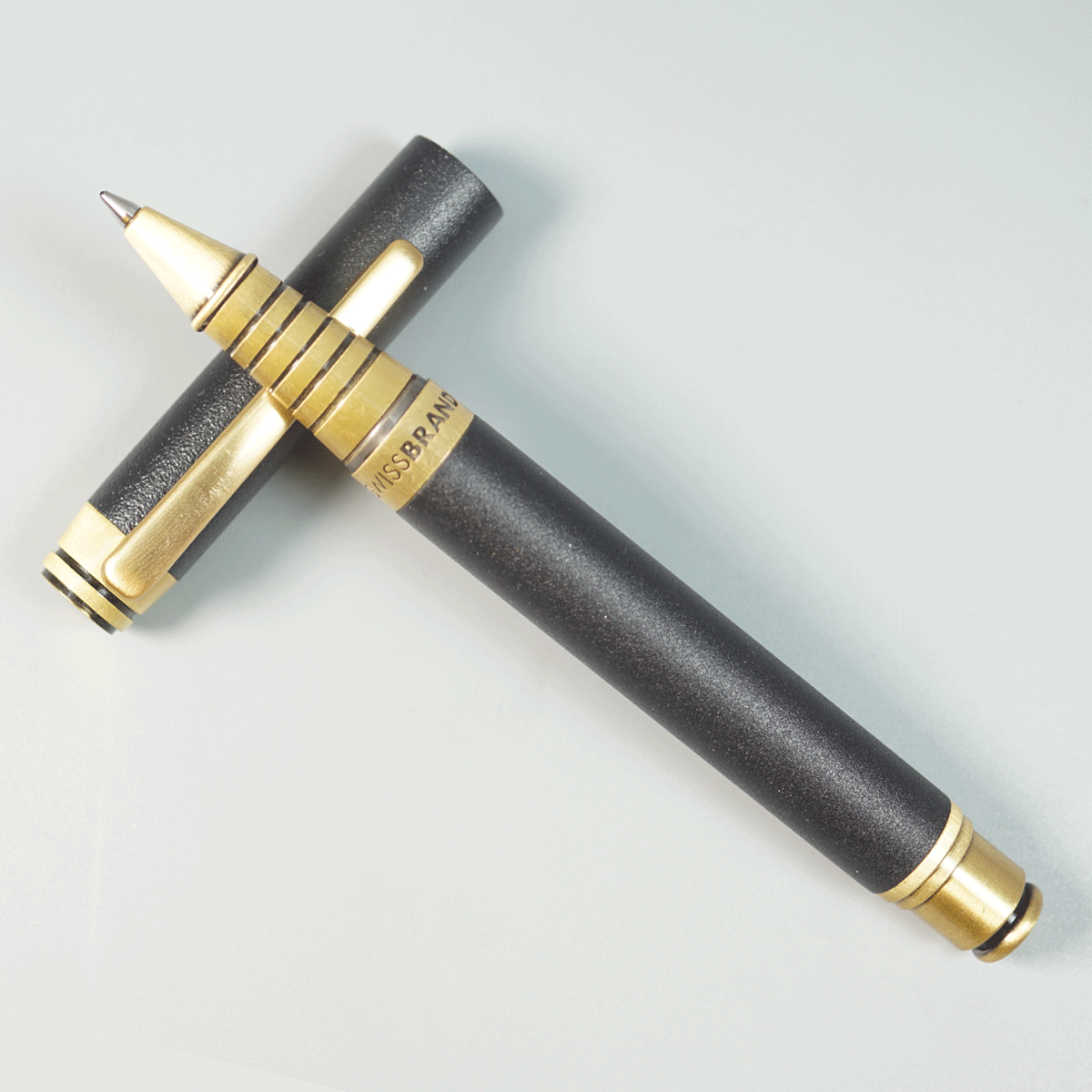 Swiss Brand 2501 Matte Black Color Body And Gold Color Trim And Clip Cap Type Roller Ball Pen  SKU 29025